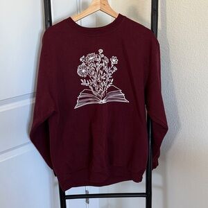 Burgundy Sweatshirt with Floral Book Design